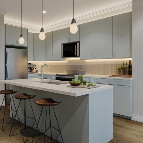 a kitchen with a bar stool and a table