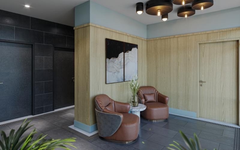 a room with a couch and chairs